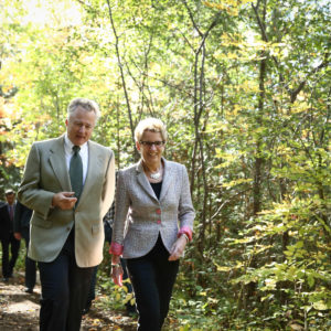 Premier Wynne and Paul LaBarge, chair of the Trans Canada Trail, walk through the Greenwood Conservation Area in Ajax, Ont. (Photo: Queen's Printer for Ontario)