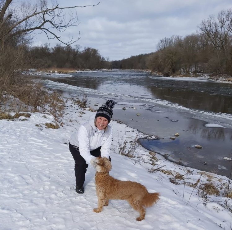 Deb Allerton explores the Grand River trails with her granddog.