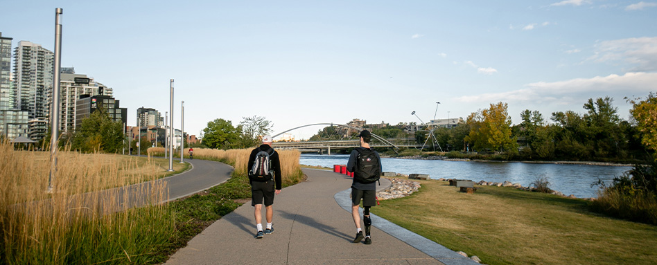 Two adults training for a marathon on the Trans Canada Trail in Calgary