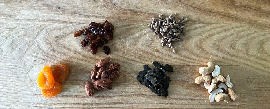 Trail mix ingredients: nuts, seeds, and dried fruit