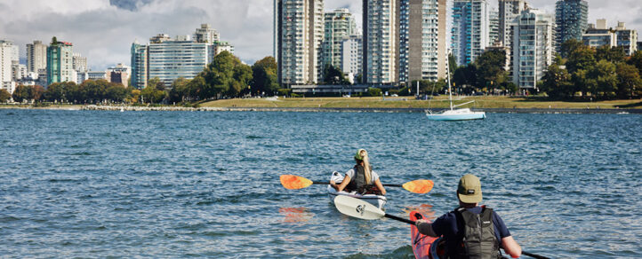 Two people in canoes on the water