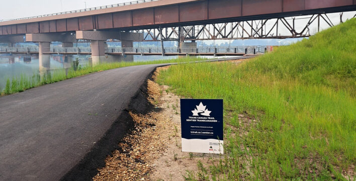 River Valley Alliance Pedestrain Bridge and a Trans Canada Trail sign
