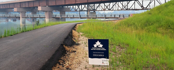 River Valley Alliance Pedestrain Bridge and a Trans Canada Trail sign