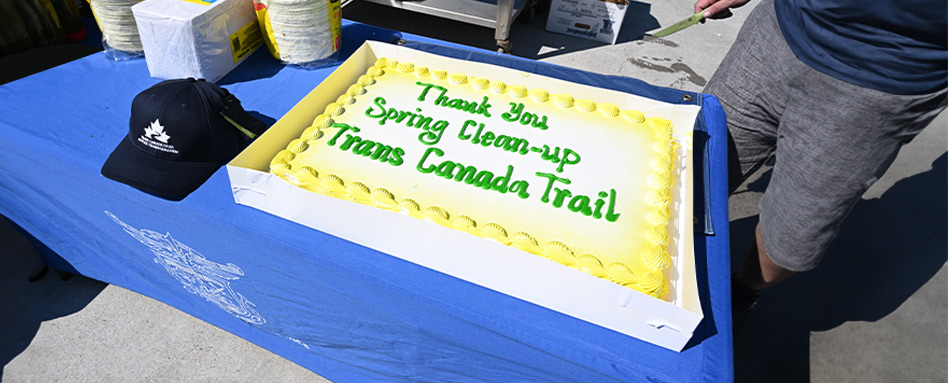 A cake with "Thank you Spring Clean-Up Trans Canada Trail" at the Trail Care Event: City of Yellowknife at Frame Lake Trail 