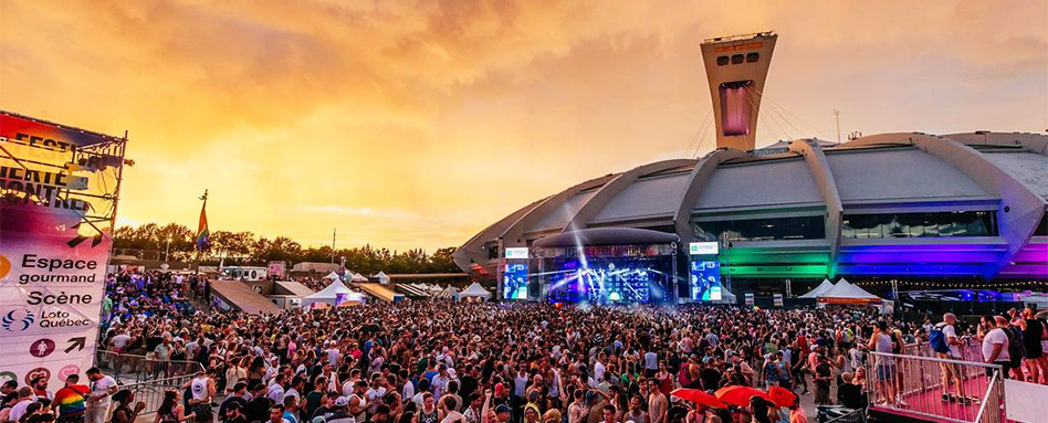 A vibrant crowd gathers at Fierté Montréal festival | Une foule vibrante se rassemble au festival Fierté Montréal