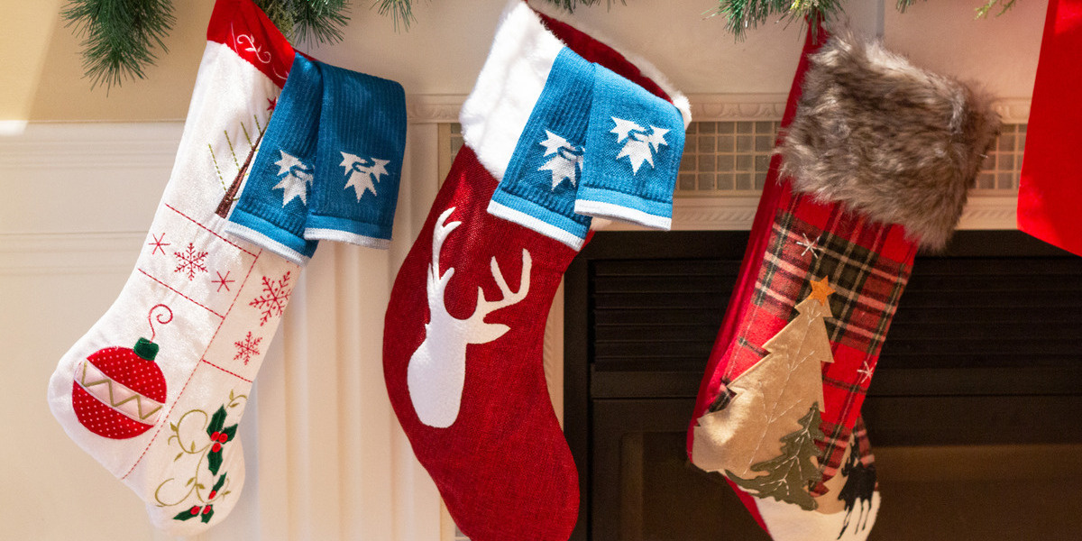 Holiday stockings over a fireplace