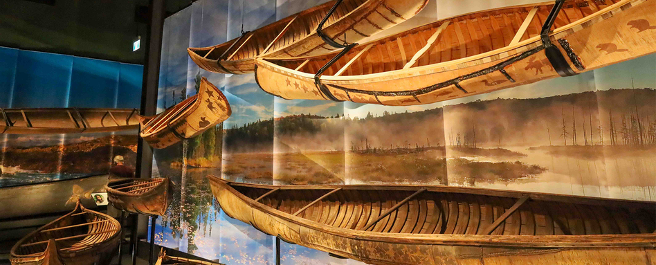 phpto of canoes in museum