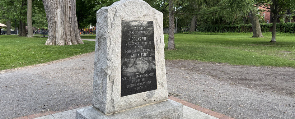 tombstone in a park
