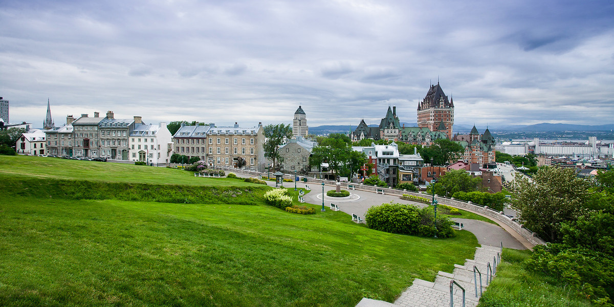 view of quebec city valley with grass and staircase