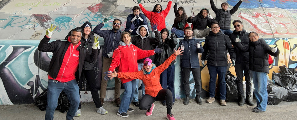 people in winter gear smiling and posing 