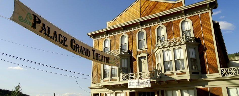 Spooky Stories_Palace_Grand_Theatre_Dawson_City_credit Adam Jones PhD | Trans Canada Trail building and banner on sunny day