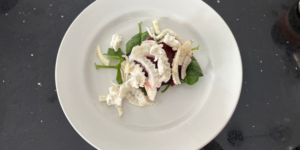 chopped salad and beets on a plate