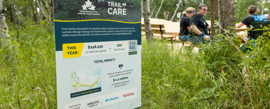 trail signage in a wooded area