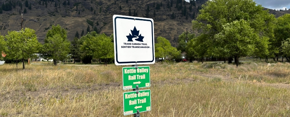 trail signage in a field