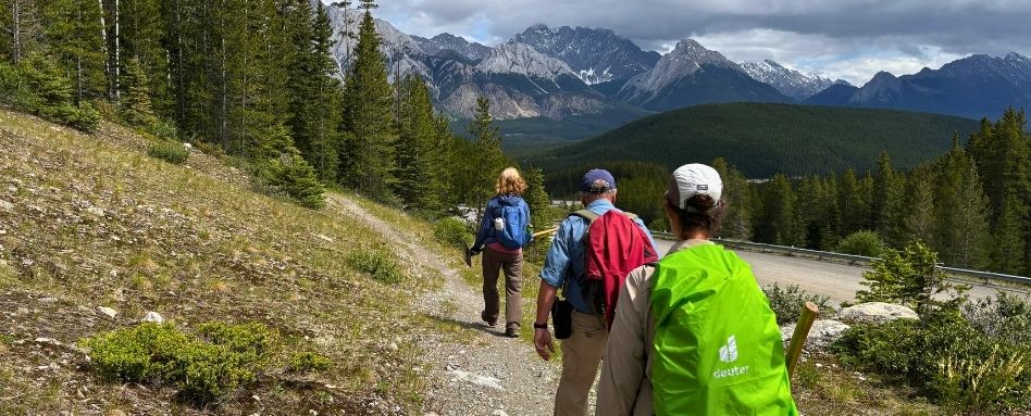 01Support image_AB_107672-Friends of Kananaskis_web story_on trail | Trans Canada Trail group of hikers on hike with mountains in the foreground