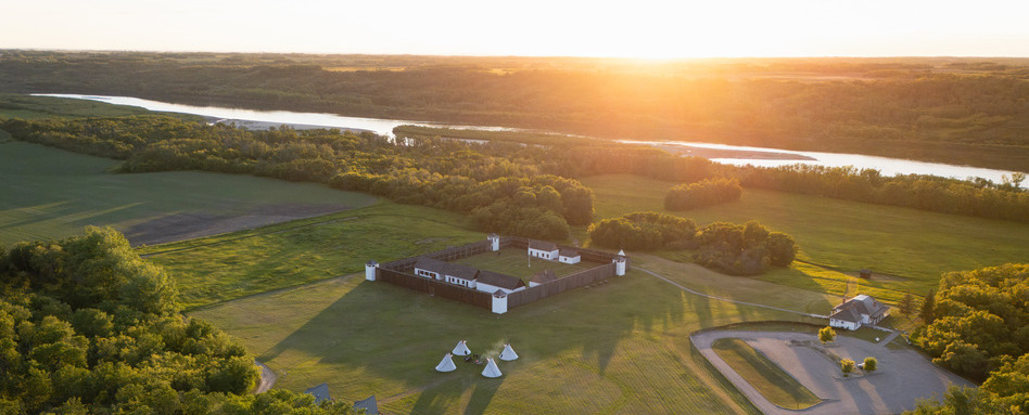 birdseye view of pemiska trail at sunset over large greenery