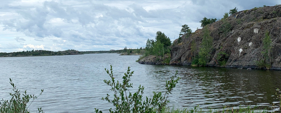 lake view with rock formation inlets