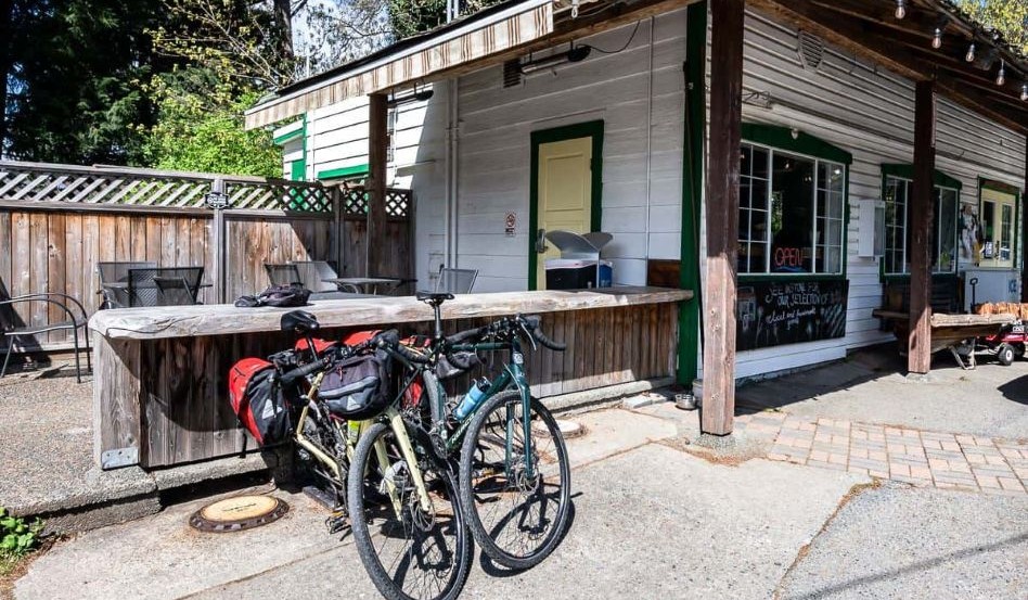 05Support image_Leigh McAdam bikepacking_Glenora Store Cafe is-a great place for lunch_resized | Trans Canada Trail large outdoor of cafe with bikes parked outfront