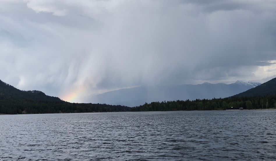 04Support image_Ali Becker West Arm Paddle Route_web story_credit Ali Becker | Trans Canada Trail rainbow after a storm overlooking water and trees